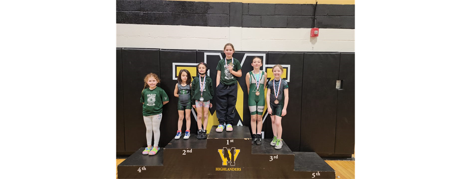 Lady Hawk Wrestlers with their Hardware